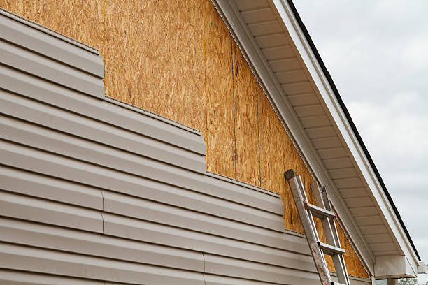 Professional Siding Contractor technician working in Covington, WA